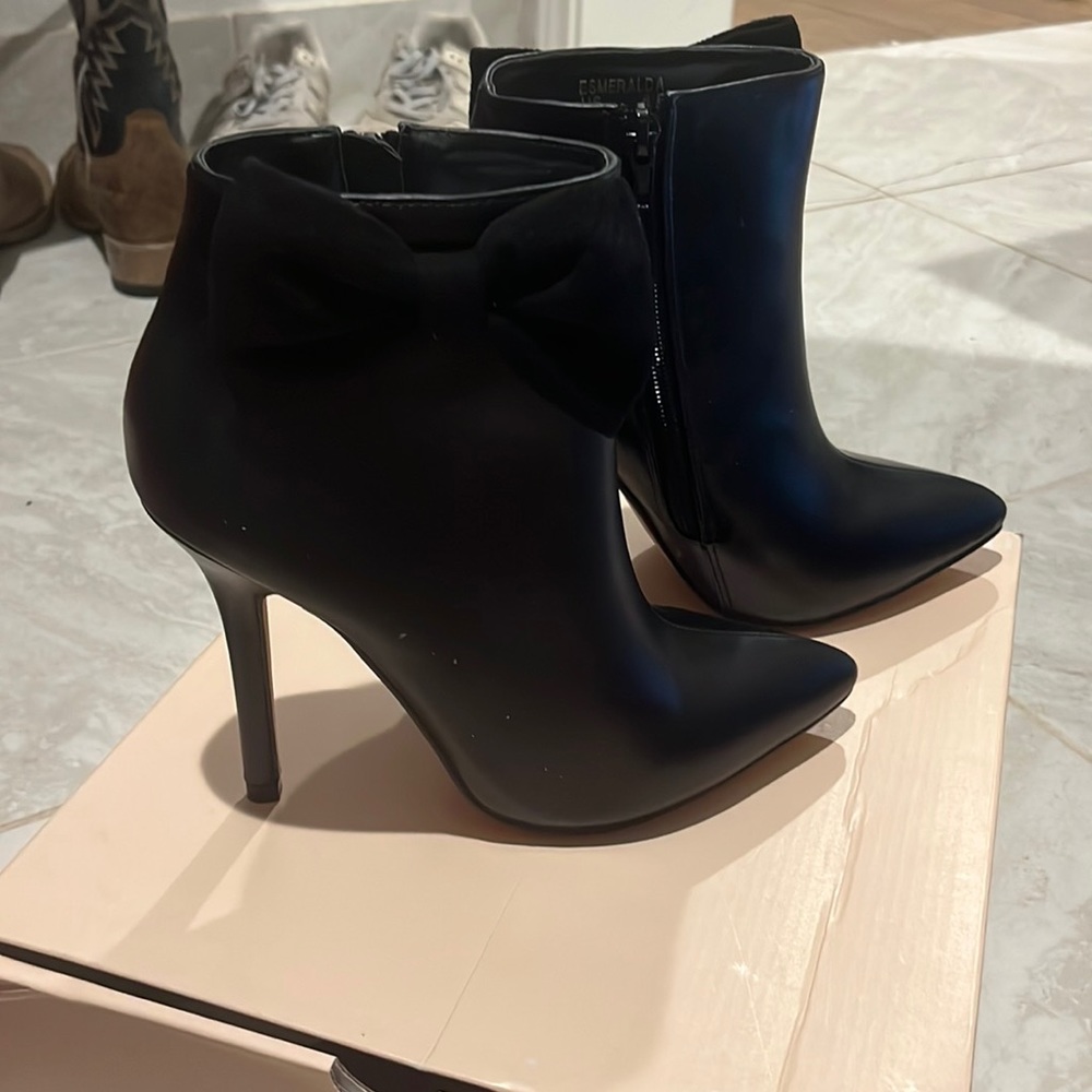 Brand New booties with a heel